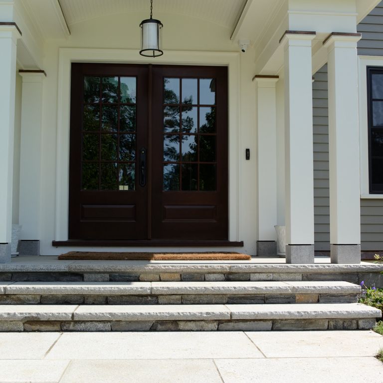 Application image for Cape Neddick Granite Clear - Rockfaced Treads. The image shows this product being used in a treads application. This is a building and landscape stone for indoor and outdoor commercial and residential applications. Suitable for general use, freeze-thaw conditions, low heat absorption surfaces, high traffic areas, low slipperiness surfaces and high heel compatibilty situations. Moderate to higher on the price spectrum.
