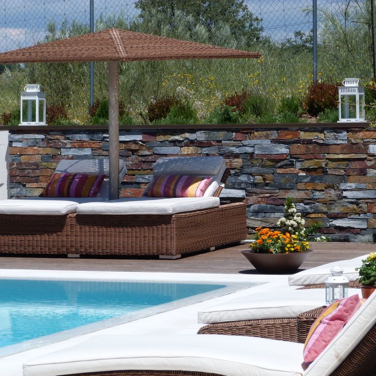 Application image for Slate - Iberian Gray - Pool coping. The image shows this product being used in a pool coping application. The dominant color shown is gray.