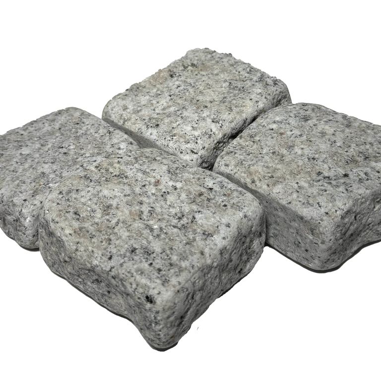 Feature image for Salt & Pepper Granite - Tumbled Cobblestones. The image shows this product being used for driveway pavers, path pavers, patio pavers and driveway aprons. The surface finish shown is . The dominant color shown is gray. The color mix creates a cool feeling.