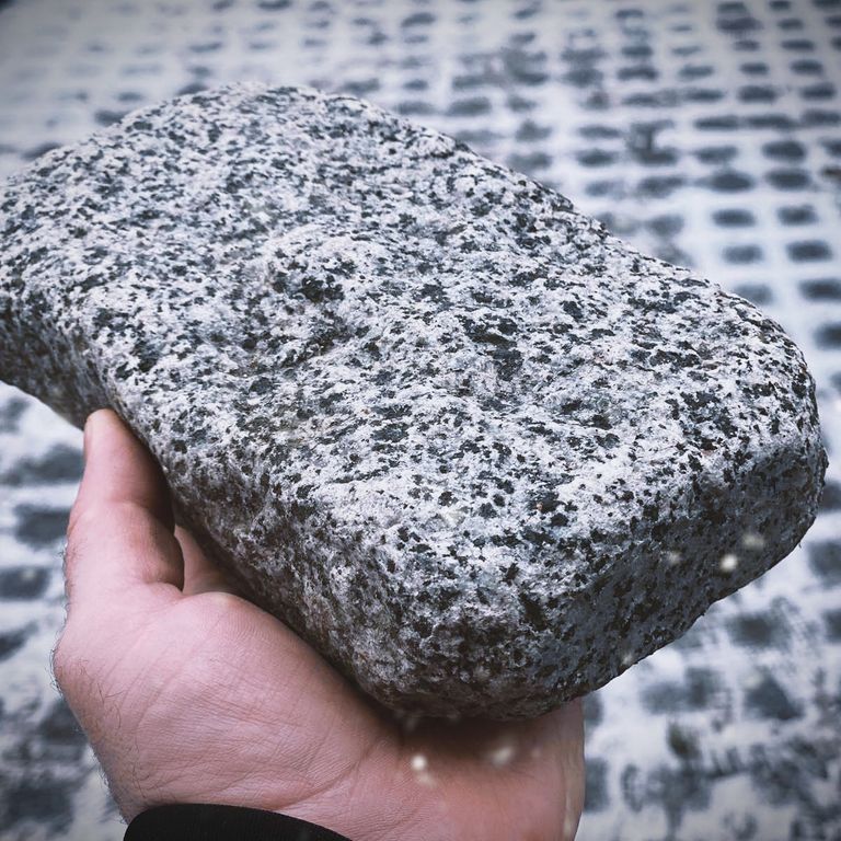 Application image for White House Granite - Tumbled Cobblestones. The surface finish shown is tumbled. Dominant colors shown are gray and white.