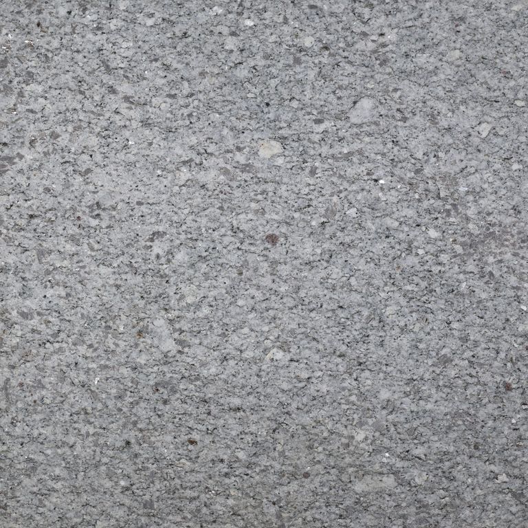 Application image for Westlake Veneer - Chelmsford Gray Granite. The surface finish shown is flamed. Dominant colors shown are gray and white. The color mix creates a cool feeling.