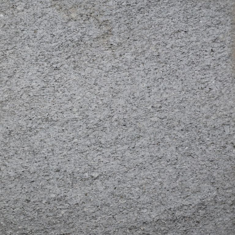 Application image for Westlake Veneer - Chelmsford Gray Granite. The surface finish shown is flamed. Dominant colors shown are gray and white. The color mix creates a cool feeling.