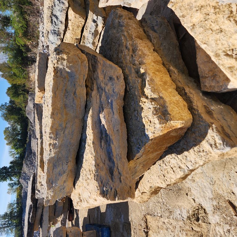 Application image for Rustic Gold Limestone - Wallstone. The surface finish shown is natural cleft. Dominant colors shown are yellow, tan and cream. The color mix creates a warm feeling.
