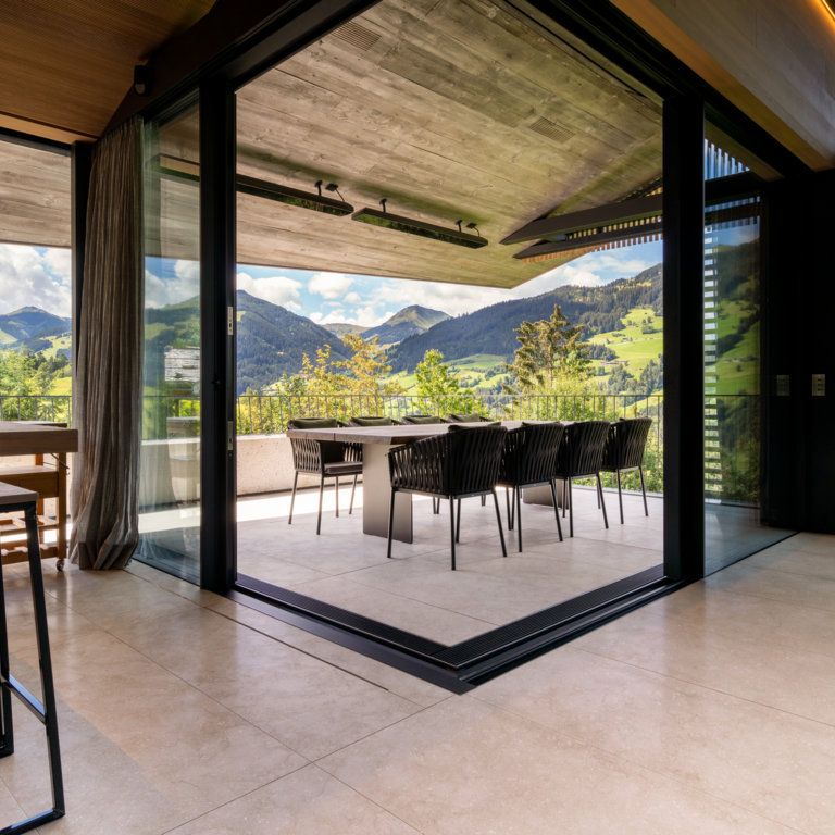 Feature image for Veneto Olivo Limestone - Interior Flooring. The image shows this product being used in an interior floor application. The dominant color shown is beige. The color mix creates a warm feeling.