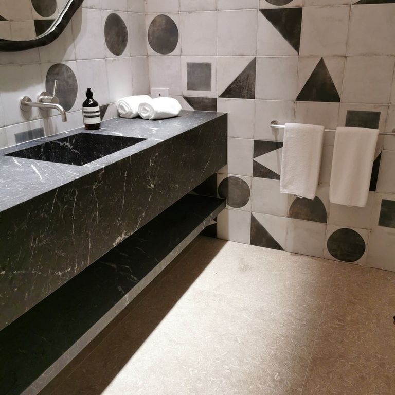 Application image for Veneto Olivo Limestone - Interior Flooring. The image shows this product being used in an interior floor application. The surface finish shown is . Dominant colors shown are beige and tan. The color mix creates a warm feeling.